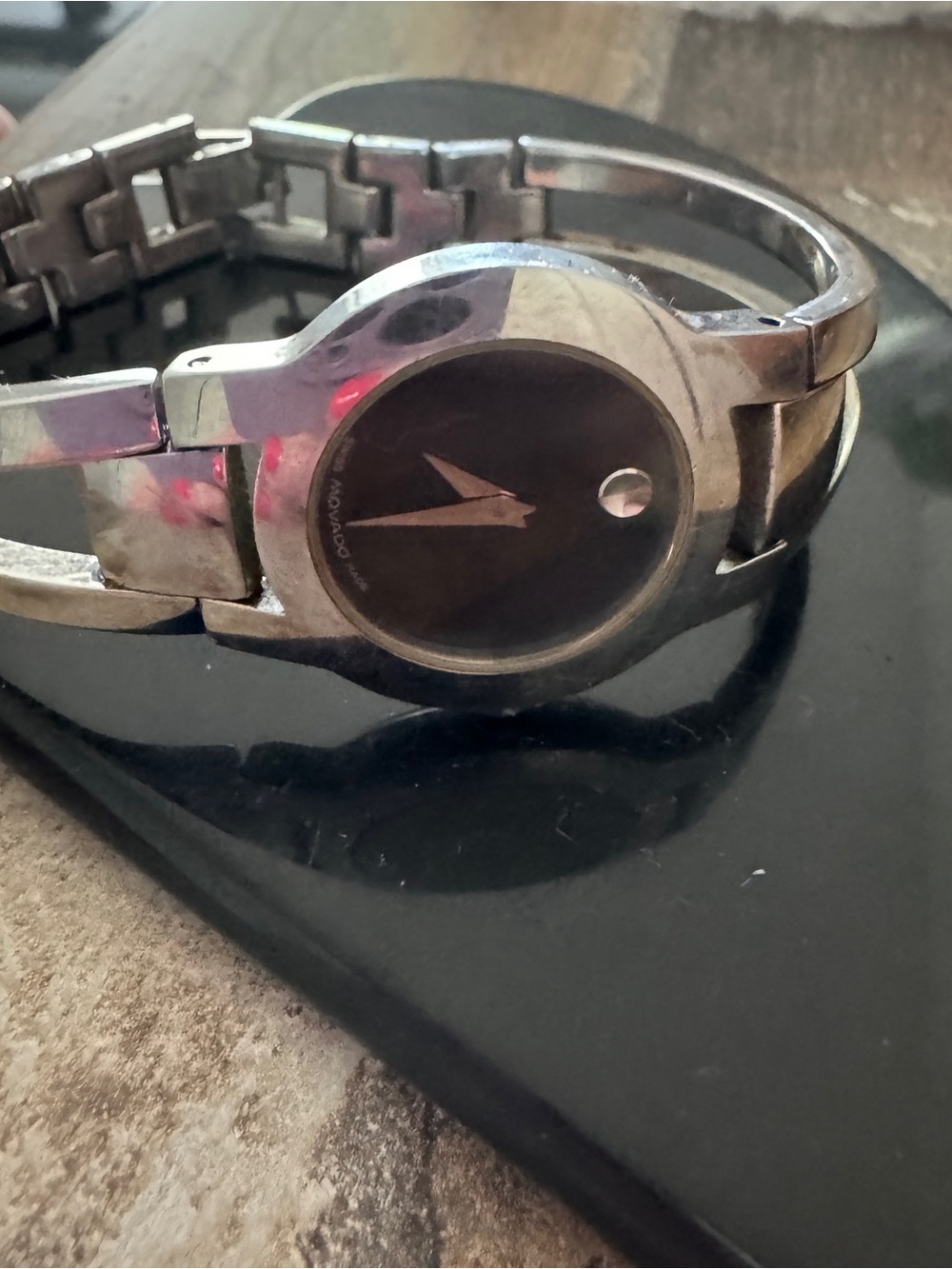 Movado Silver-Tone Black Dial Women's Bracelet Watch. Excellent condition